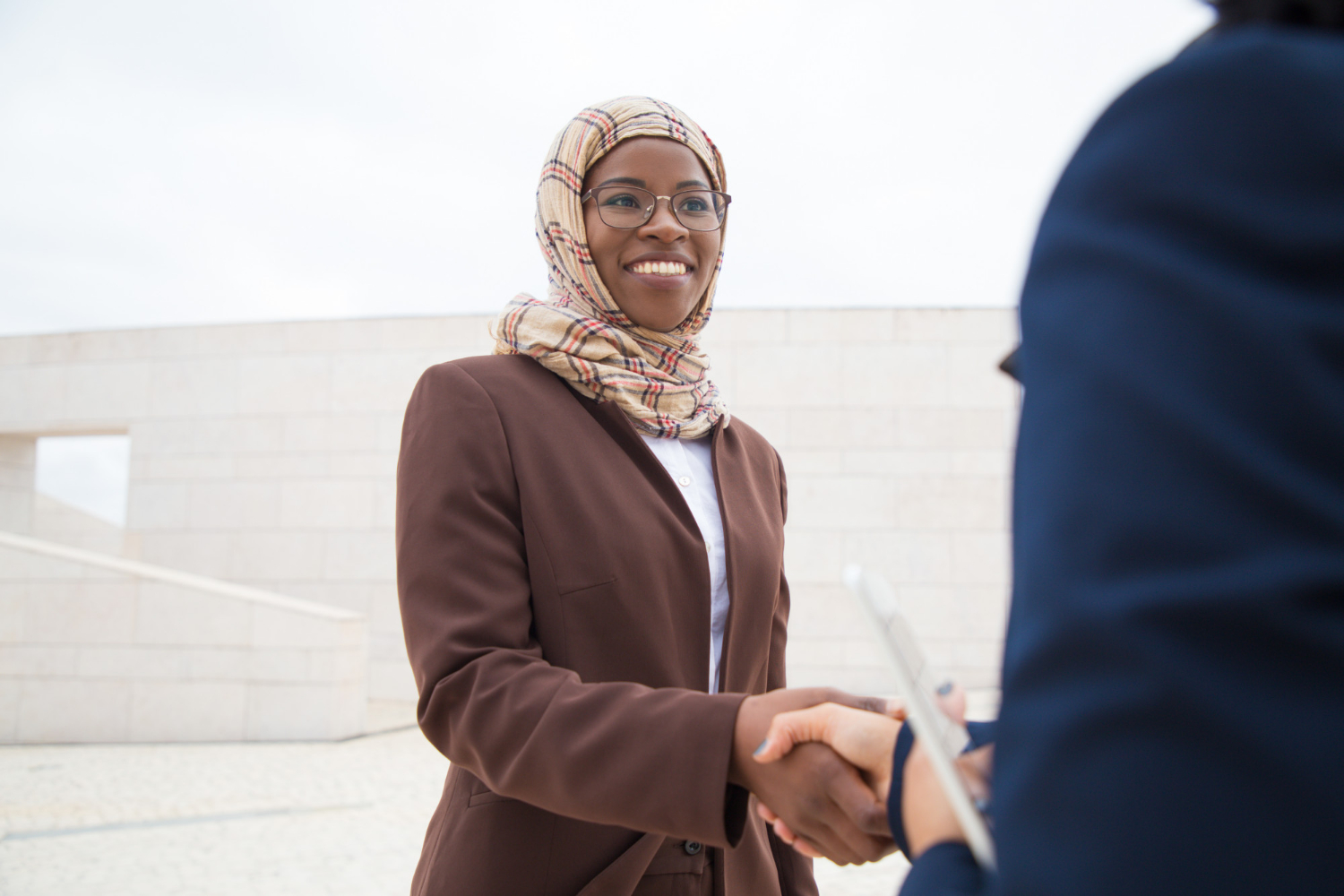friendly-business-lady-meeting-thanking-coworker
